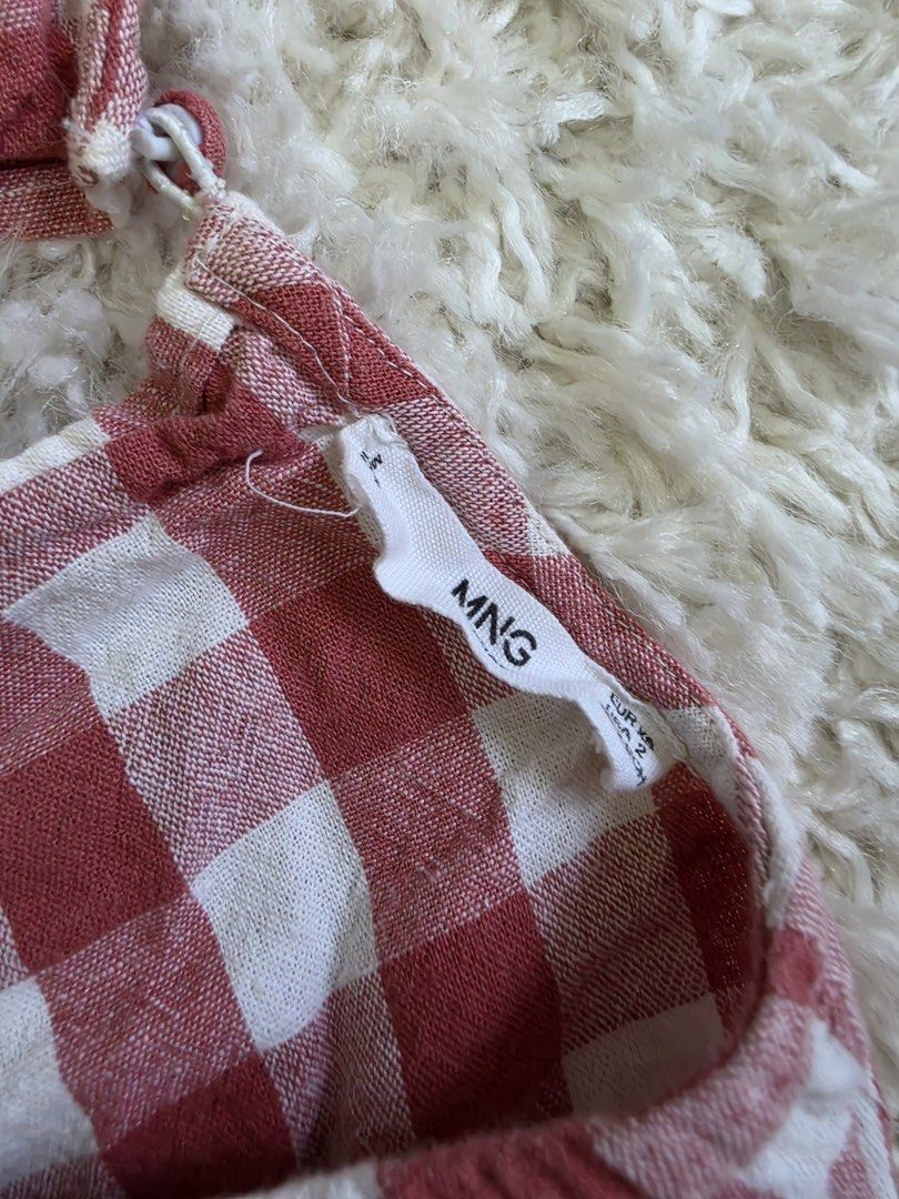 Mango Red Gingham Button Down Midi Dress (Category: Dresses) located in Mandaluyong City. Submitted by thequeenarci (Listing ID 1457626161, Image 2). Description: - Cute red and white gingham midi dress - Brand: Mango - Features: Button down front, pockets - Size: Tag says XS, fits a small 350 - Perfect for casual outings or picnics.