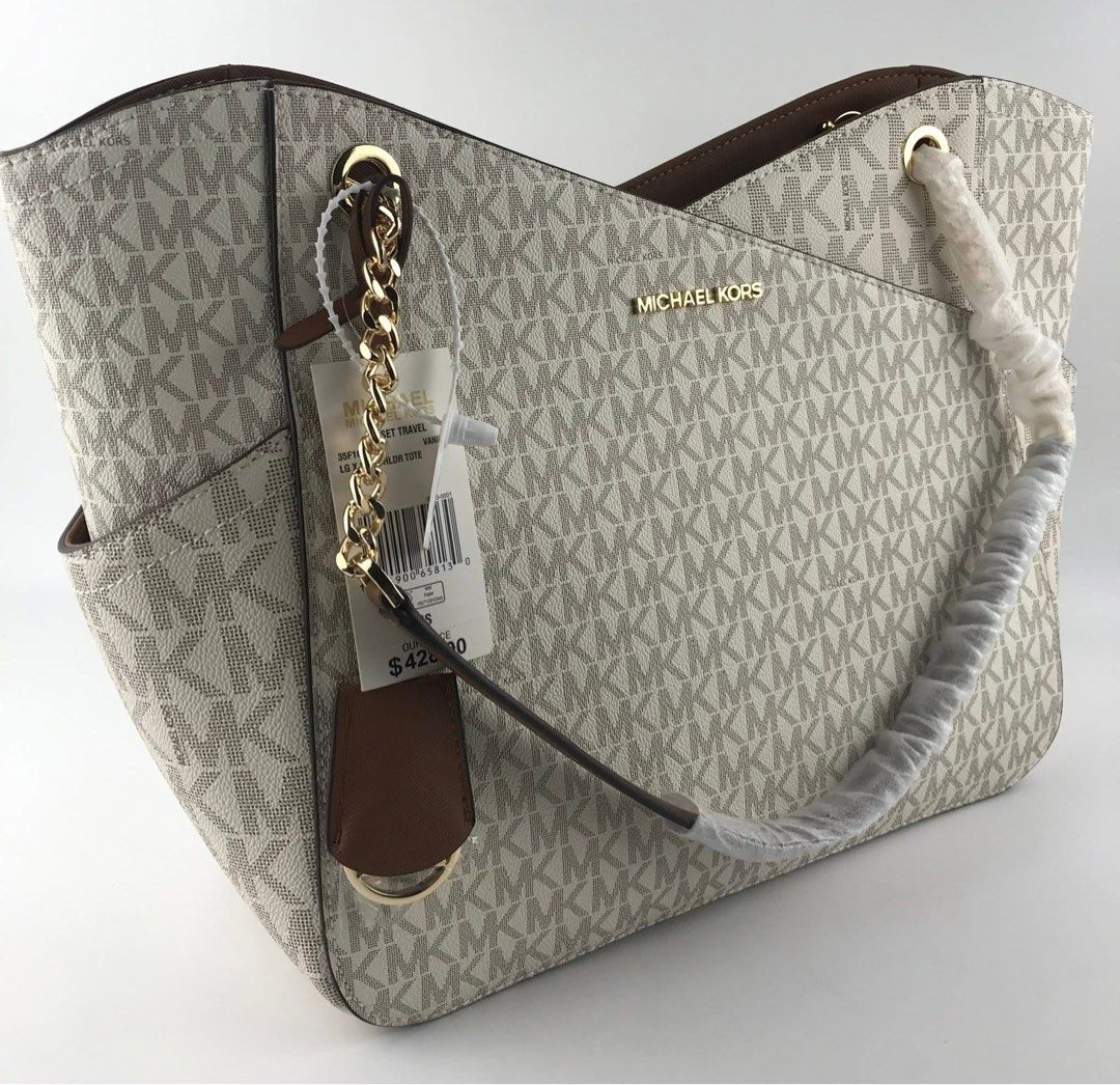 MK Jetset Travel Tote Bag (Category: Tote Bags) located in Manila. Submitted by msddirectfactoryoutlet (Listing ID 1457644287, Image 3). Description: MK Jetset Travel Tote 15.6”W X 11”H X 5.5”D US Grade 100%.