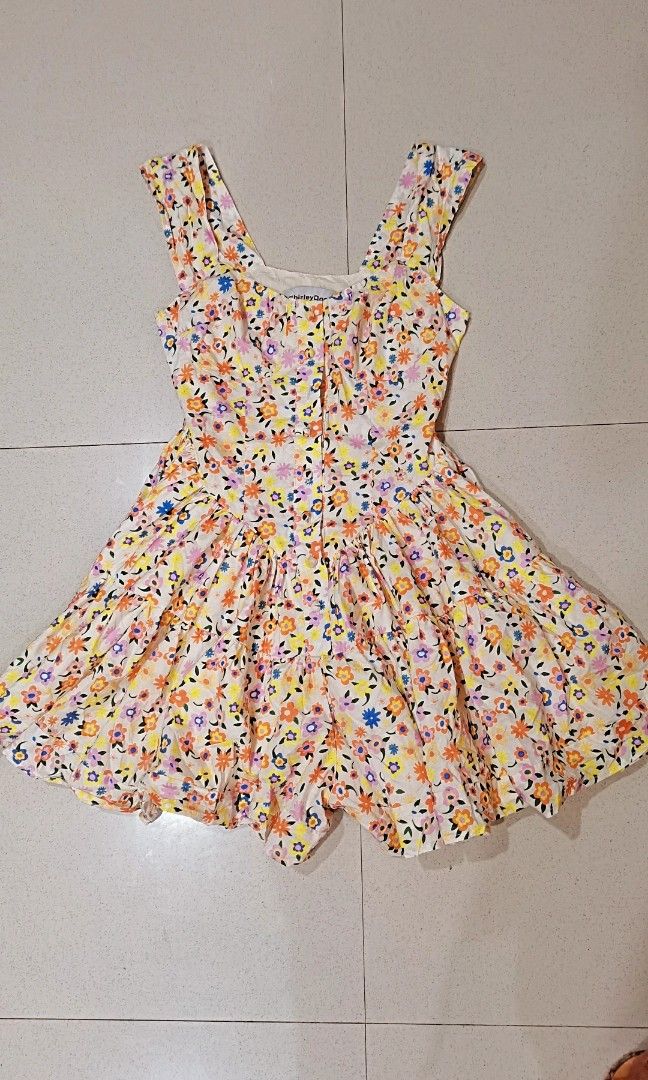 Multicolored floral buttondown romper dress (Category: Rompers) located in Batangas. Submitted by micaelaul (Listing ID 1457607620, Image 2). Description: 30-32 bust 24-26 waist non-stretch super ganda at rare nito, no ww lang kasi semi large frame po ako.