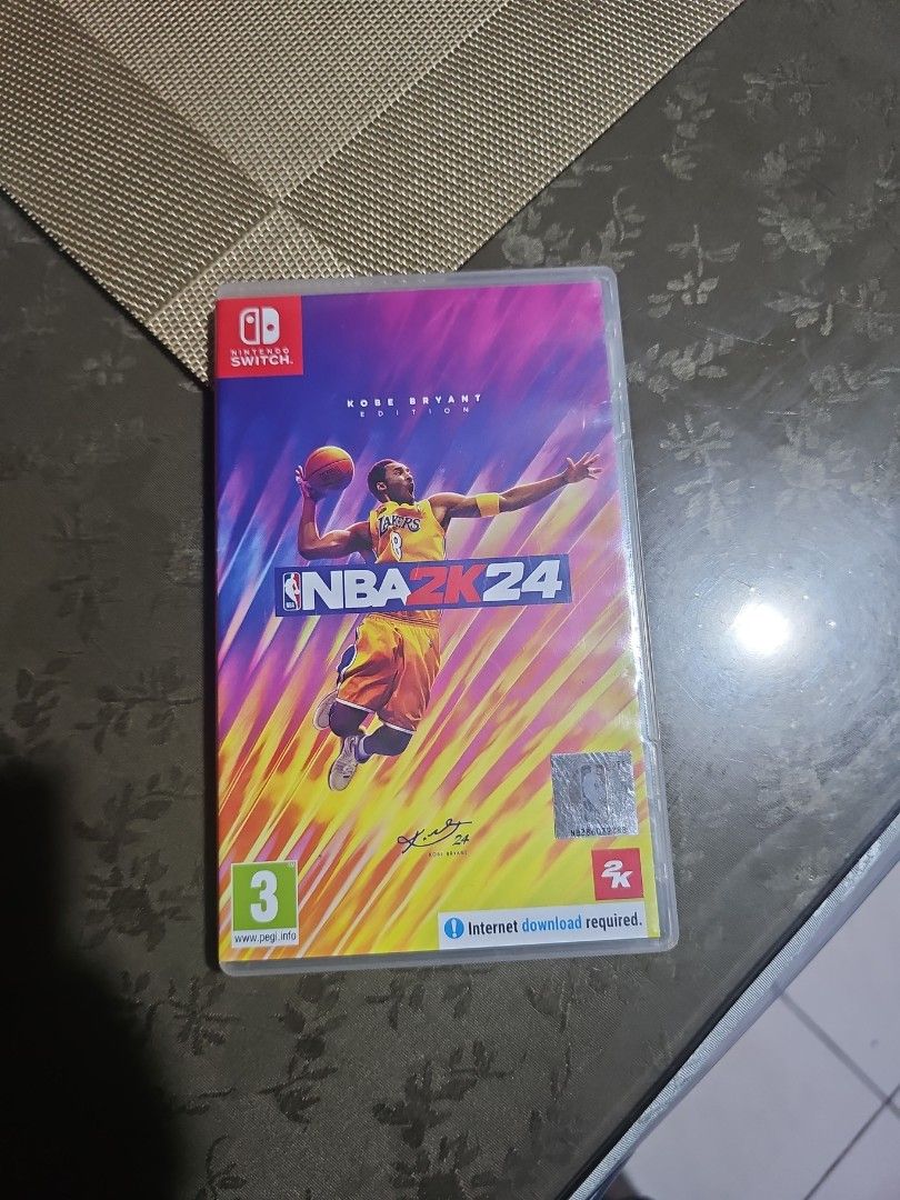 NBA 2K24 Nintendo Switch Game Kobe Bryant Edition (Category: Nintendo) located in Batangas. Submitted by pspiso (Listing ID 1457617325, Image 1). Description: - NBA 2K24 for Nintendo Switch - Features Kobe Bryant on the cover - Includes pre-order bonus - Game cartridge and case included - Great for basketball fans.