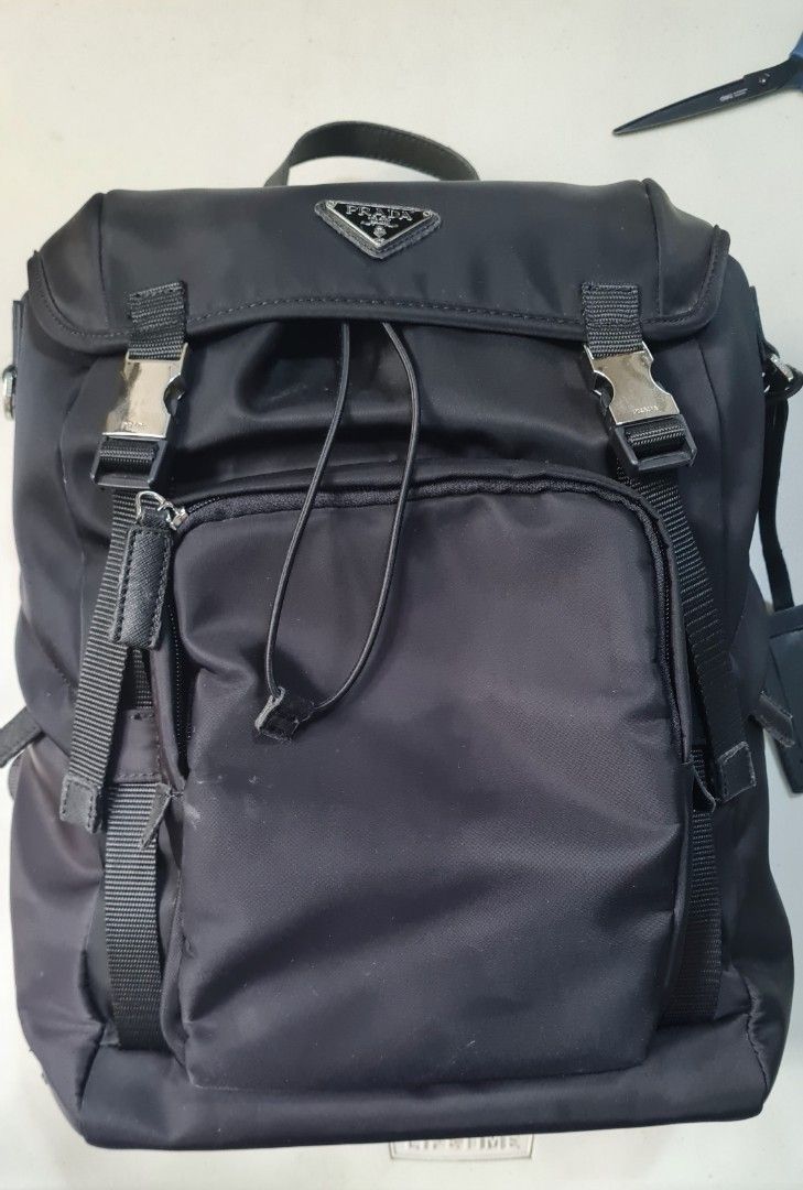 Branded Black backpack for men and women (see description) (Category: Backpacks) located in Quezon City. Submitted by shaneshadow (Listing ID 1457575701, Image 3). Description: FS: Prad@ x Adid@s Branded backpack (not og) Negotiable if sure buyer!! RFS: Not using it anymore **Condition: 7/10 with few damages (see pics) **Can fit 16 inch laptop Location: QC area.