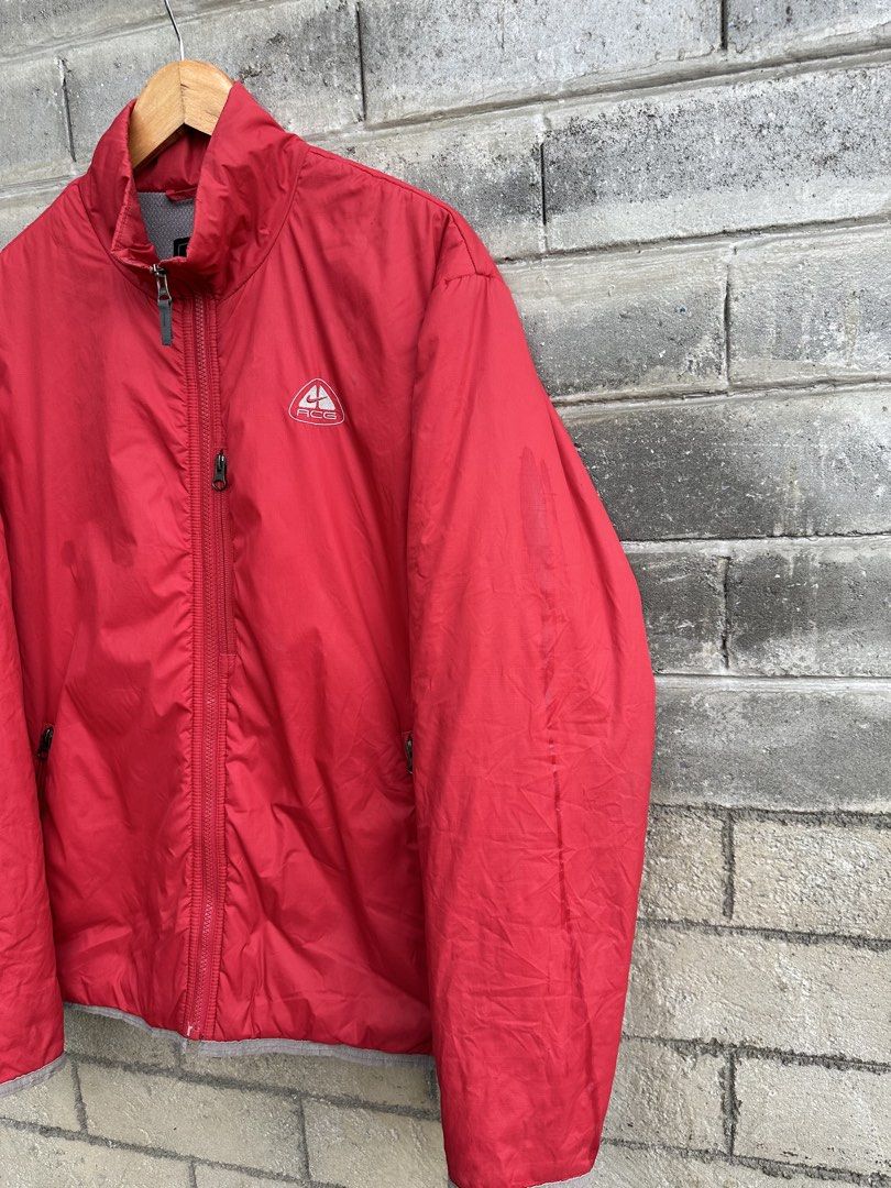 Nike ACG Layer 3 Outer Shell Zip-Up Jacket (Category: Coats, Jackets and Outerwear) located in Urdaneta. Submitted by redeemedcollective (Listing ID 1457644429, Image 3). Description: An authentic archival piece from Nike’s iconic late-90s to early-2000s ACG (All Conditions Gear) line. Built as a versatile Layer 3 outer shell, this jacket features a durable red exterior paired with a breathable grey mesh interior and secure utility pockets. A cla