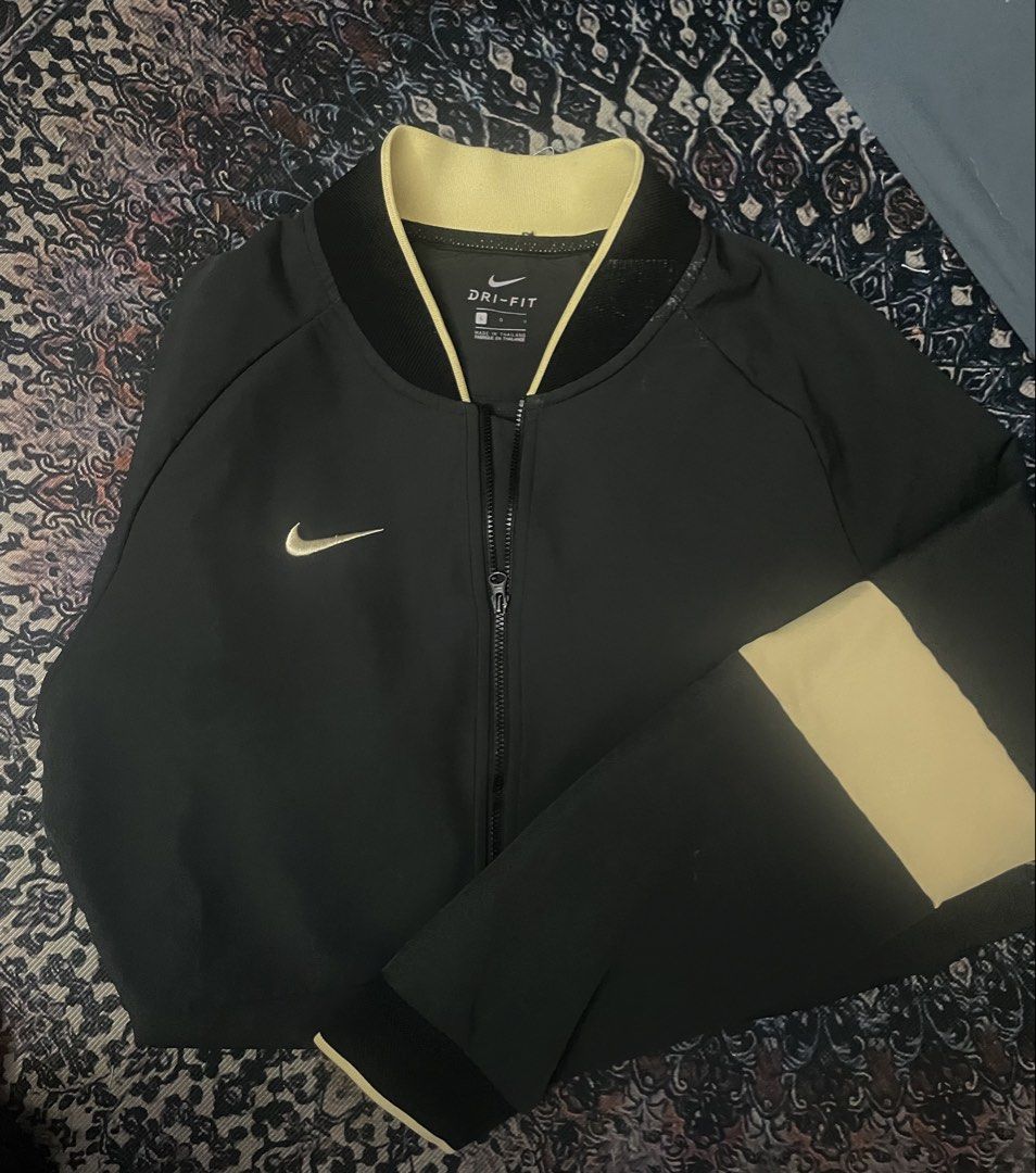 NIKE DRY FIT BOMBER JACKET (Category: Activewear) located in Quezon City. Submitted by kromy71 (Listing ID 1457704334, Image 1). Description: This jacket is crafted with midweight, tightly knit fabric that’s smooth, stretchy and sweat wicking. Its roomy fit makes it a great layer while a two-way zip lets you adjust your coverage. Articulation at the elbows offers ease of movement and a distinct Nike Tech aesthetic..