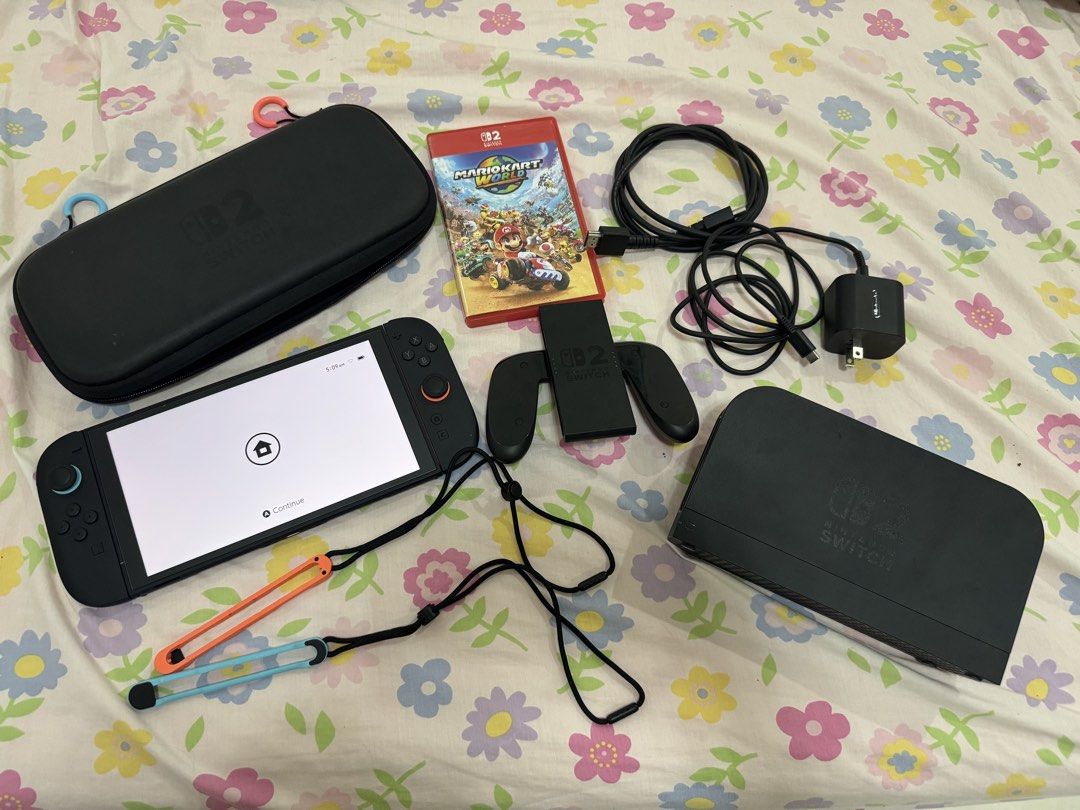 Nintendo Switch 2 + Mario Kart Bundle w/ Carrying Case (Category: Nintendo) located in Caloocan City. Submitted by wildstorm.e1ac4c (Listing ID 1457632660, Image 1). Description: Condition: -9.5/10 (Lightly used, complete set, bought last December 2025) -Screen is scratch-free (screen protector applied since day 1 ) -No issue/no drift/crisp buttons Package Inclusions: - Nintendo Switch 2 Console & Joy Cons -Original Docs, High-Speed HDMI Cable & 