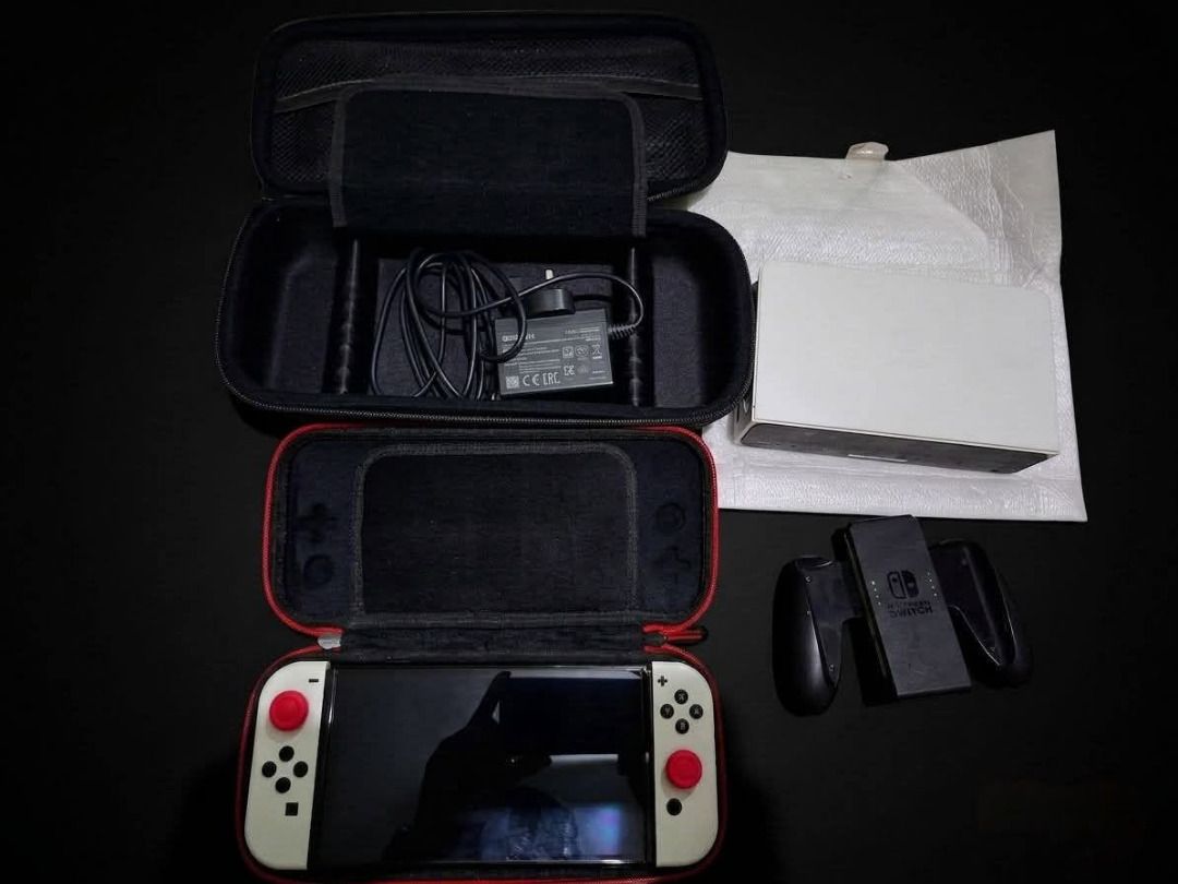Nintendo Switch OLED (Category: Nintendo) located in Manila. Submitted by coke4every1 (Listing ID 1457582104, Image 1). Description: Nag laro lang ng Animal Crossing then stock na siya. No Games included No HDMI cord naiwan sa ibang bahay With box hindi lang na isama sa picture. *Bring your Own game cartridge and SD card for testing*.