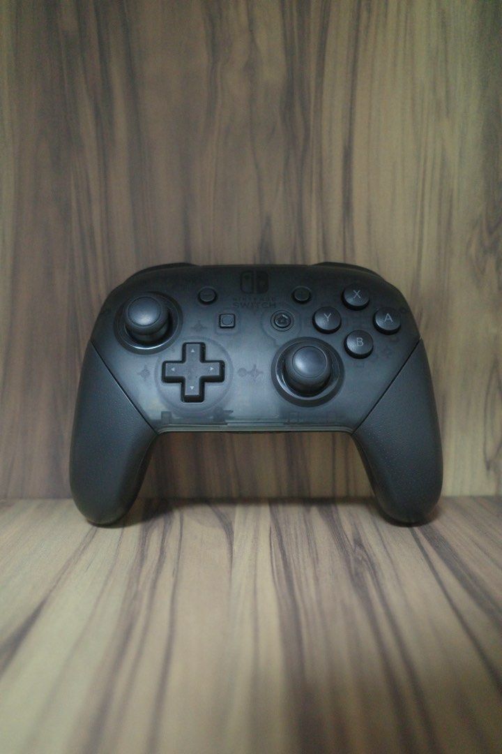 Nintendo Switch Pro Controller (Category: Controllers) located in Singapore. Submitted by zhyap828 (Listing ID 1457518968, Image 1). Description: Black Nintendo Switch Pro Controller. Bought 3 years ago, everything still in perfect condition..