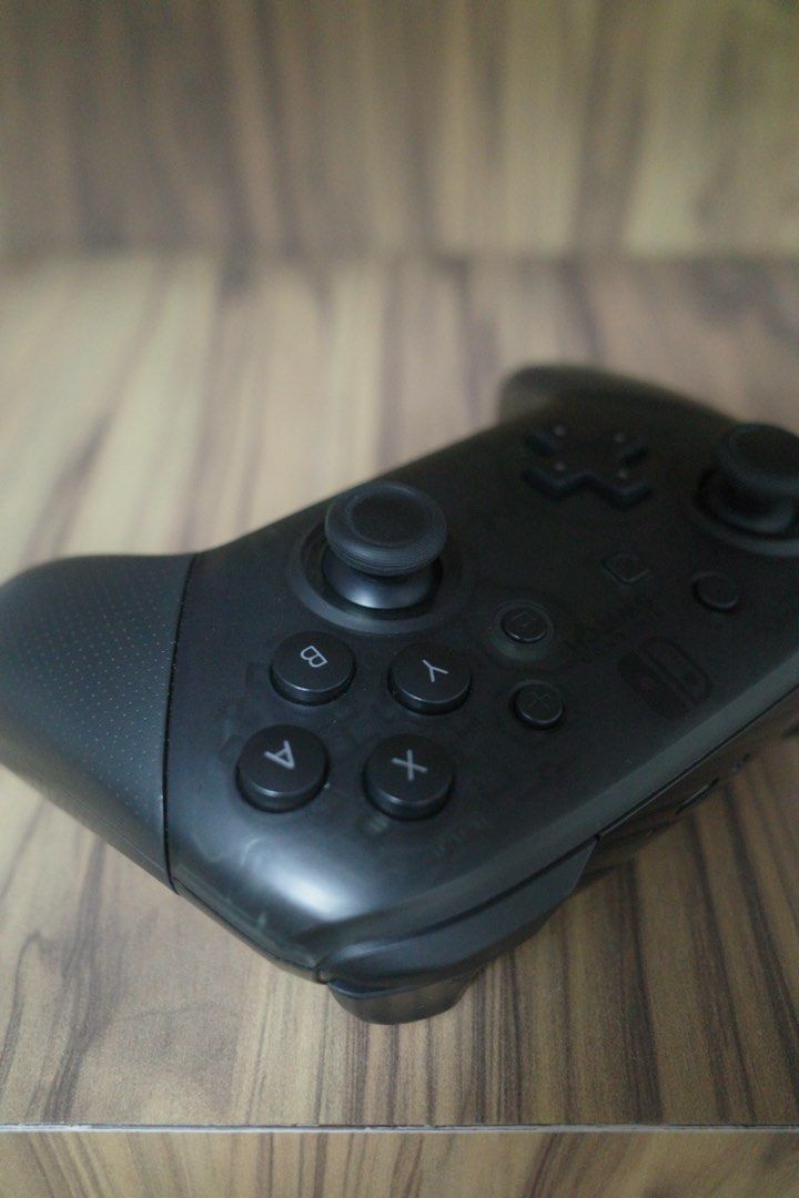 Nintendo Switch Pro Controller (Category: Controllers) located in Singapore. Submitted by zhyap828 (Listing ID 1457518968, Image 3). Description: Black Nintendo Switch Pro Controller. Bought 3 years ago, everything still in perfect condition..