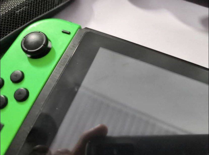 Nintendo Switch V2 Console with Games and Accessories (Category: Nintendo) located in Caloocan City. Submitted by zeonical2131 (Listing ID 1457697704, Image 2). Description: - Nintendo Switch Console - Includes Dock, Joy-Cons, and Charger - Comes with a Carrying Case - Games Included: Zelda, Mario Party, Super Smash Bros., NBA 2K20 - Ready for new adventures!.