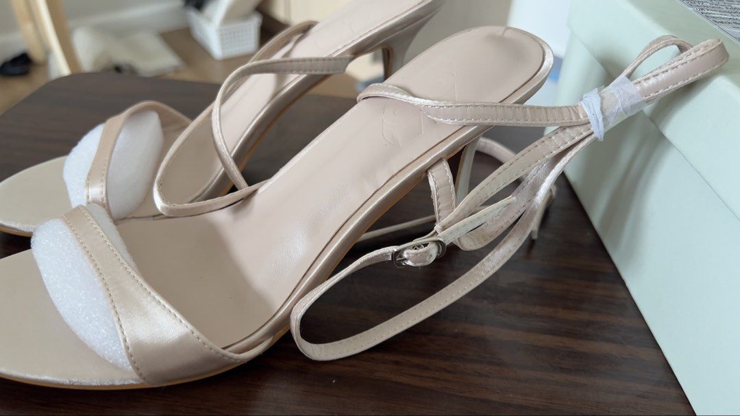 Nude Strappy Heeled Sandals (Category: Heels) located in Cebu City. Submitted by shopgalora (Listing ID 1457545685, Image 2). Description: - Never been used; too large for me - Nude strappy heeled sandals - Delicate straps with buckle closure - Kitten heel height - Satin-like material - Comes with original box - Super cute for dressing up!.