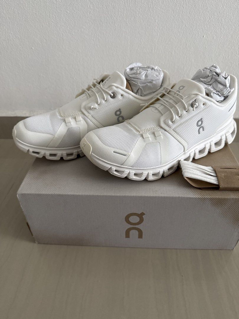 On Cloud 6 (Category: Sneakers) located in Singapore. Submitted by miss_siti (Listing ID 1457549869, Image 1). Description: White/ White US 9.5 EU 41 UK 7.5 JP 26.5 Used twice. Slightly negotiable. Self collection only. 209B Compassvale Lane .