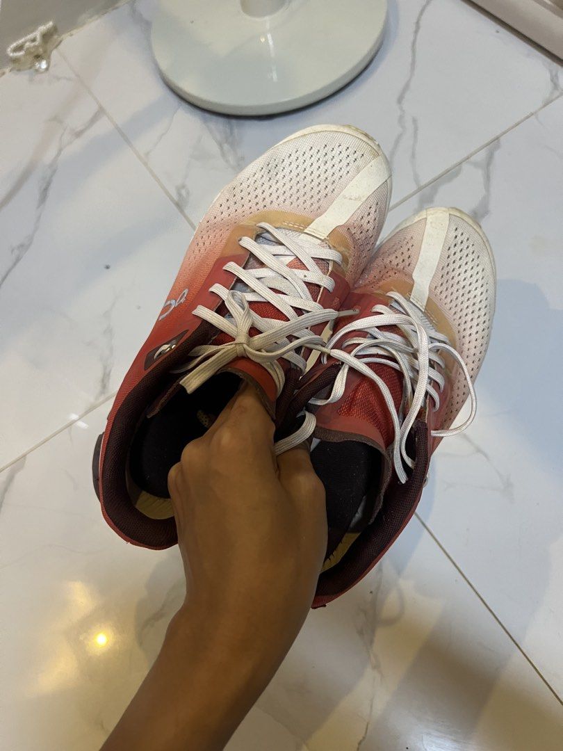 On Cloud Womens Cloudflow Running Shoes Sneakers Rust Red Eclipse White (Category: Sneakers) located in Romblon. Submitted by justjdeclutters (Listing ID 1457702345, Image 2). Description: Still in good condition just needs cleaning! 😅 - ON Cloud running shoes - Size: US 7 / EUR 38 - Color: Red and white - Perfect for running or everyday wear - Shows minor signs of wear on soles and uppers - Plenty of life remaining - Sold as is.