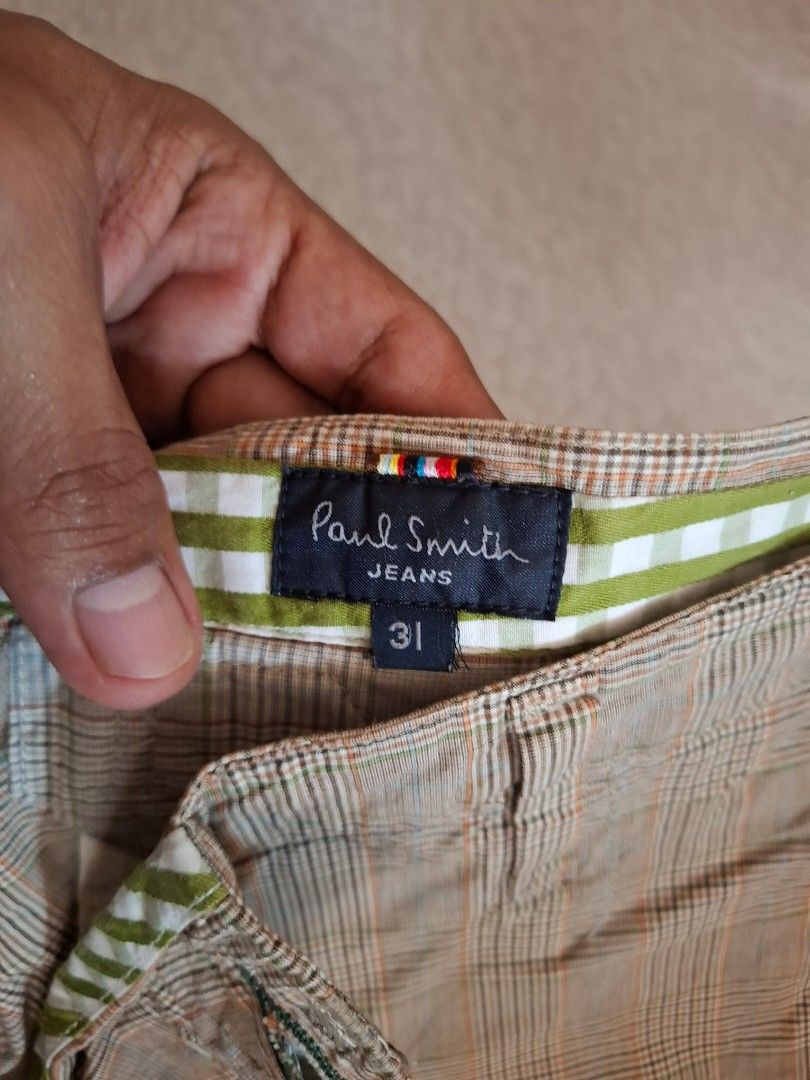 Paul Smith Jeans Plaid Trousers Size 31 (Category: Trousers) located in Santa Rosa. Submitted by edwin8573 (Listing ID 1457539718, Image 3). Description: - Brand: Paul Smith Jeans - Style: Classic Plaid Trousers - Color: Brown and Beige Tones - Closure: Button Fly - Size: 31 - Perfect for: Smart Casual Looks.