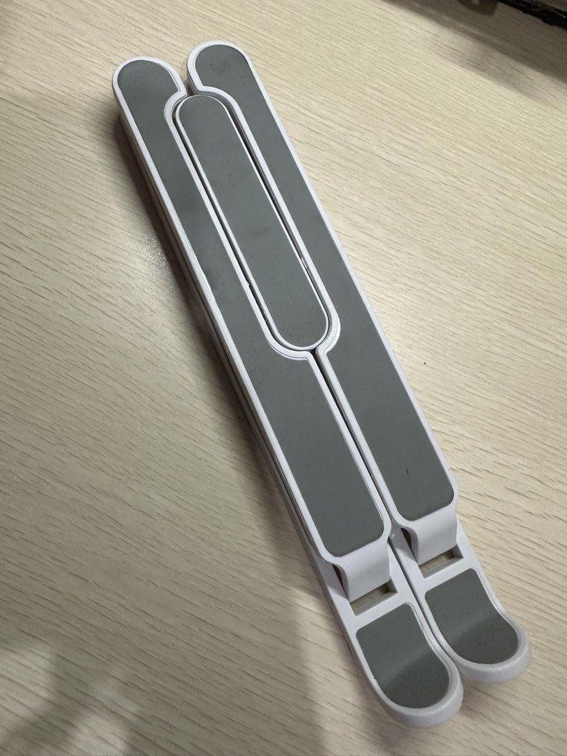 Plastic Laptop Stand Tablet Stand Portable Laptop Stand (Category: Laptop Bags & Sleeves) located in Manila. Submitted by shopkriscloset (Listing ID 1457694330, Image 1). Description: ‼️PLEASE READ BEFORE PLACING AN OFFER: 🩵Please be patient and respectful. 🤗 If I don’t get to reply immediately, I might be working. 🧡Please REFRAIN from making an offer if you do not intend to complete the purchase. 🧡Kindly read the description for more details