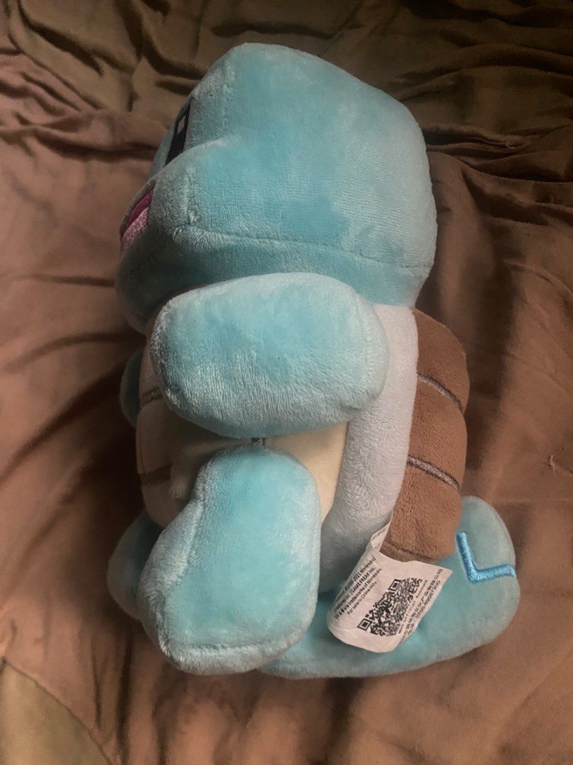 Pokemon Squirtle Plush Toy (Category: Plushies & Soft Toys) located in Manila. Submitted by kuya_moto (Listing ID 1457590987, Image 2). Description: - Adorable Squirtle plush toy - Approximately 6 inches tall - Super soft and cuddly material - Perfect for Pokemon fans of all ages - Ideal for display or playtime fun.