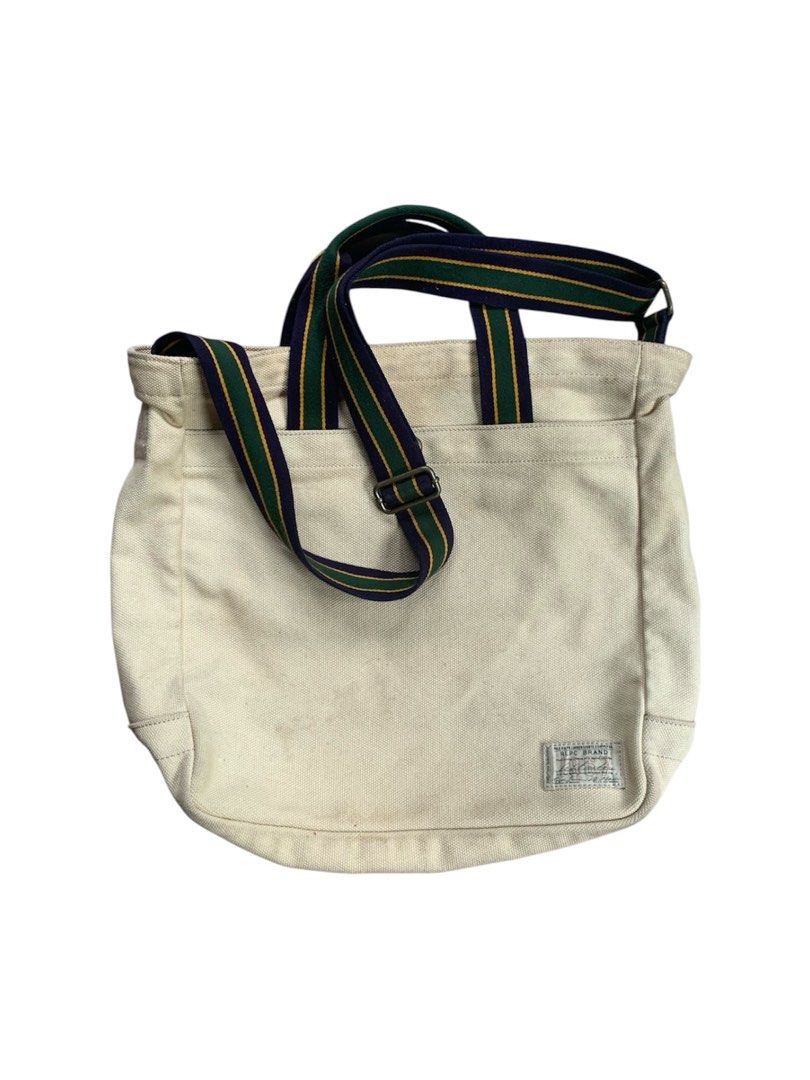 Polo Ralph Lauren Tote Bag (Category: Luxury Bags & Wallets) located in Buhi. Submitted by sneak_pick (Listing ID 1457530034, Image 1). Description: Polo Ralph Lauren Tote Bag Very Minimal signs of use. Excellent condition. 100% Cotton Canvas Shell Firm: 78% Acrylic 22% Polyethylene Made in China Height: 14.5” Width: 18” Depth: 15” Condition: 9/10 Flaw/s: Minimal dirt.