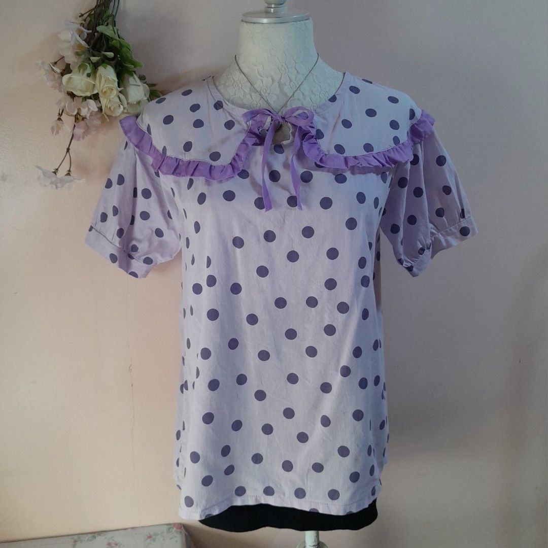 Preloved Korean Lavender Polka-dot Ruffled Collar Top (Category: Blouses) located in Caloocan City. Submitted by ailove_ph (Listing ID 1457664760, Image 1). Description: ♡ Preloved pieces, handpicked with love ♡ Color may vary due to lighting ♡ Items are preloved, please manage your expectations ♡ DM for inquiries Thanks loves!💕.
