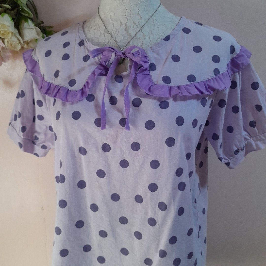 Preloved Korean Lavender Polka-dot Ruffled Collar Top (Category: Blouses) located in Caloocan City. Submitted by ailove_ph (Listing ID 1457664760, Image 2). Description: ♡ Preloved pieces, handpicked with love ♡ Color may vary due to lighting ♡ Items are preloved, please manage your expectations ♡ DM for inquiries Thanks loves!💕.