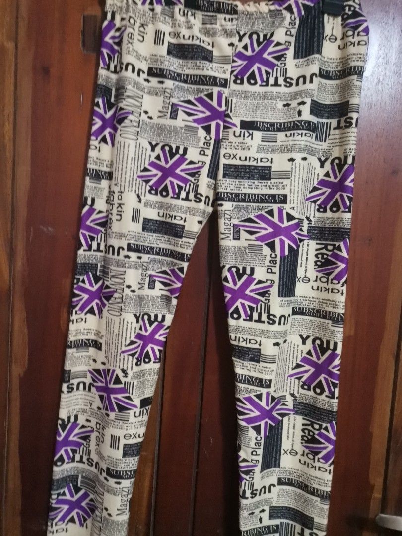 Printed Leggings - Tribal & Newspaper/Union Jack (Category: Activewear) located in Makati City. Submitted by kookybearsstuff (Listing ID 1457640208, Image 2). Description: - Two pairs of leggings included. - Stretchy material for comfort. - Both appear to be a size Medium. - Design 1: Brown and white tribal print. - Design 2: Newspaper print with purple Union Jack flags. - Ideal for casual outings or relaxing at home. - 250 each.