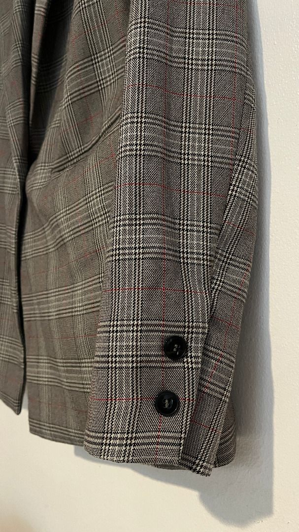 Pull & Bear Plaid Double-Breasted Blazer (Category: Coats, Jackets and Outerwear) located in Bacoor. Submitted by nana_yuzu (Listing ID 1457526567, Image 3). Description: - Stylish grey and black plaid pattern - Single button front closure - Two buttons on each cuff - Fully lined for comfort - Versatile for layering over tops or dresses - Ideal for both work and casual occasions.