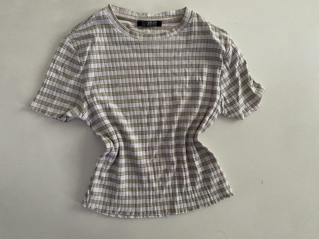 Pull & Bear Ribbed Striped T-shirt (Category: Shirts) located in Marikina City. Submitted by makeitmorepretty (Listing ID 1457548694, Image 1). Description: - White and green ribbed t-shirt - Brand: Pull & Bear - Features: Short sleeves, lettuce hem - Fabric: Textured ribbed material - Estimated Size: Medium or Large - Perfect for: Casual wear.