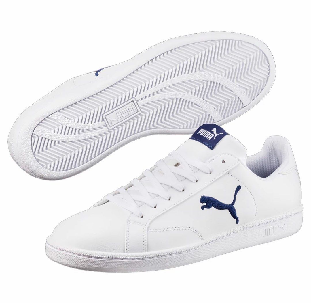 Puma Smash V2 Leather Sneakers White Navy (Category: Sneakers) located in Quezon City. Submitted by mr_luiboi09 (Listing ID 1457592871, Image 1). Description: - Classic white Puma sneakers - Navy blue accents - Iconic Puma cat logo on side and tongue - White rubber sole - Includes original Puma box - Ideal for casual wear BRAND NEW Original Price: 3400 RFS: Wrong sizing.