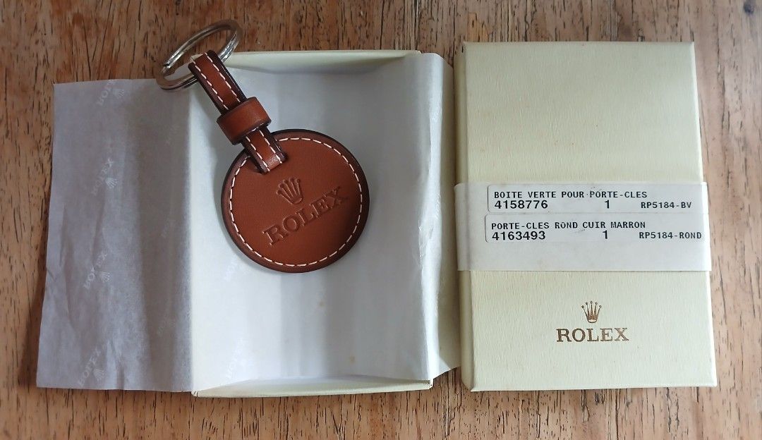 Rare ROLEX Brown Keychain (Category: Luxury Bags & Wallets) located in Manila. Submitted by myclosetraiders.ph (Listing ID 1457522803, Image 3). Description: ❗️For Sale❗️ ⌚ RARE ROLEX COLLECTOR'S ITEM🌟 A beautiful Rolex Brown Leather Keychain complete with its original Rolex presentation box, labels, and tissue paper. ⭐ Promotional Rolex item ⭐ Brown leather with embossed Rolex crown ⭐ Complete original packaging ⭐ Excellent condition ⭐ Vintage 