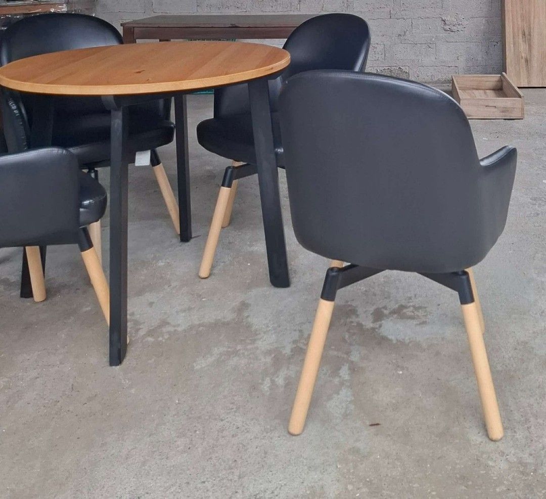 Round Table and 4 Rotating Chairs Dining Set (Category: Tables & Sets) located in Antipolo. Submitted by roselle001 (Listing ID 1457651331, Image 2). Description: - Complete 4-seater dining set - Includes 1 round table and 4 rotating chairs - Table dimensions: 34" W x 34" L x 29.5" H - Chair dimensions: 23" W x 23" L x 18" H - Versatile use: dining or coffee set - Chairs: black upholstery with light wood legs.