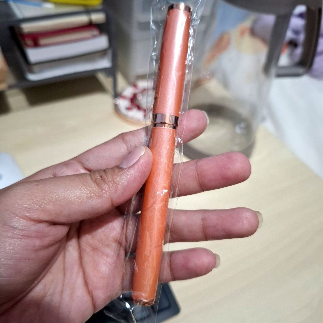Solaire Blue Pen - sold per piece (Category: Stationery & School Supplies) located in Quezon City. Submitted by an.marie (Listing ID 1457648415, Image 2). Description: Brand new Solaire fountain pen with a beautiful pearlescent orange barrel and rose gold accents. Comes sealed and offers a smooth writing experience, perfect for journaling or daily notes. A wonderful gift!.