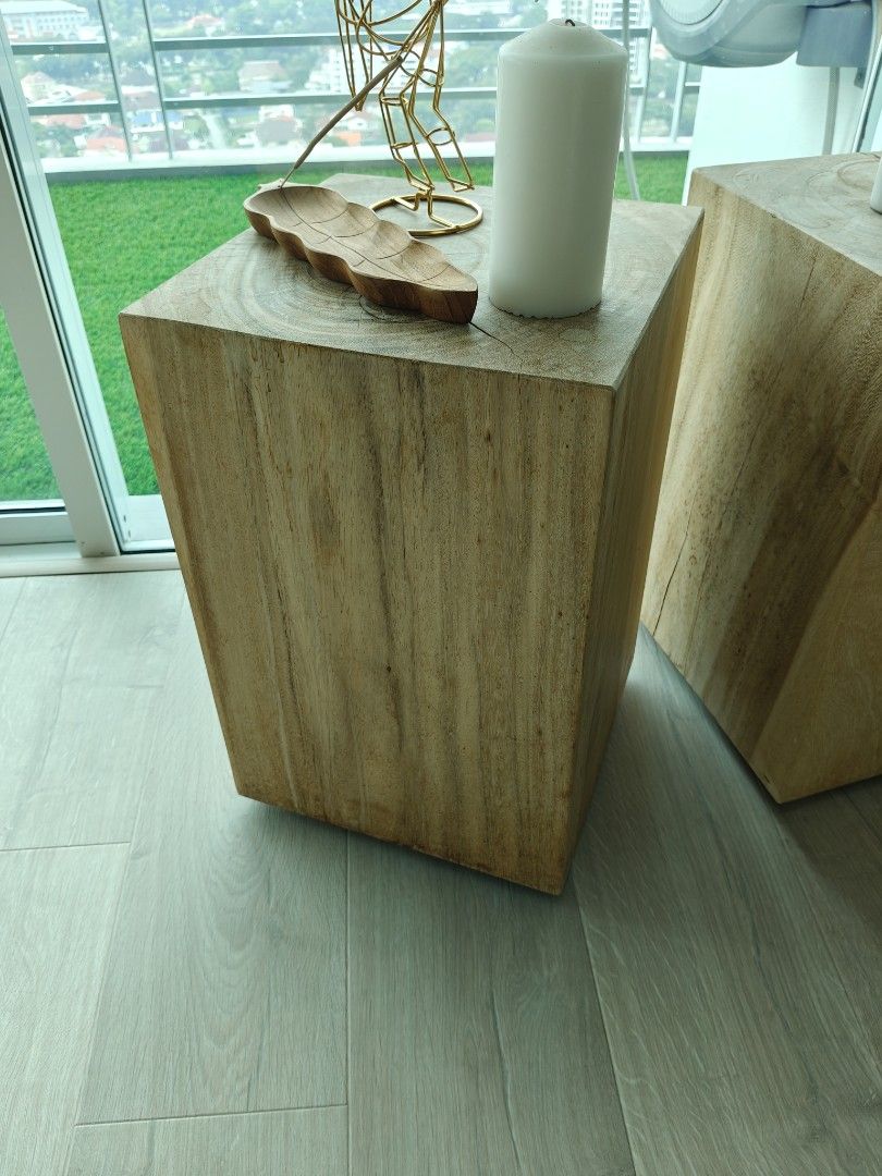 Solid Wood Block Side Table / Stool (Category: Tables & Sets) located in Ayer Itam. Submitted by jokerpoker226 (Listing ID 1457656156, Image 1). Description: - Unique solid wood block side tables or stools - Features natural wood grain and texture - Versatile use: bedside table, plant stand, or decorative accent - Each piece is unique with its own character - Available for sale as a set (rm2k) or individually (rm350) Wooden blocks (3) - 35cmx35cm