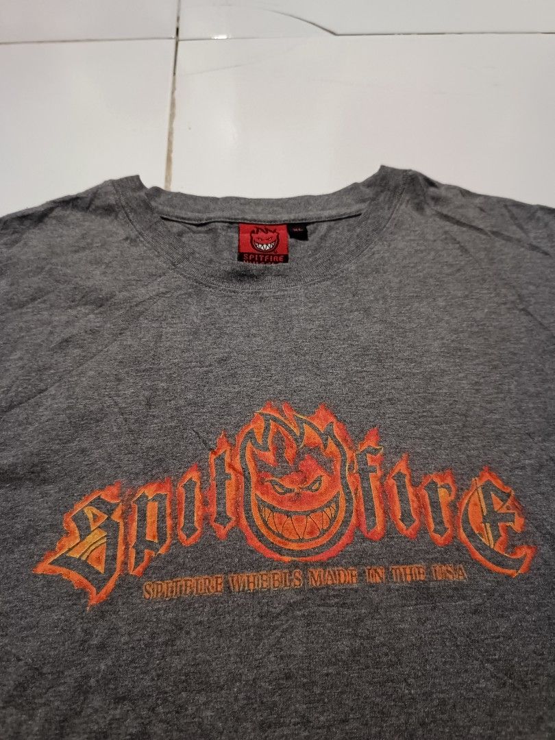 Spitfire Wheels T-Shirt XL Grey (Category: Tshirts & Polo Shirts ) located in Dumangas. Submitted by gray101 (Listing ID 1457659093, Image 2). Description: - Grey Spitfire Wheels T-shirt - Features classic Spitfire logo graphic on front - Size: XL - Made in USA - Ideal for casual wear.