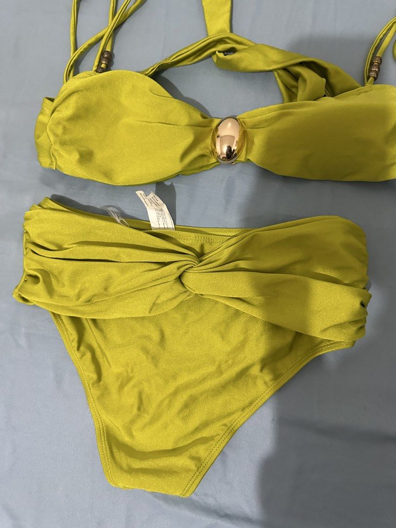 Splash Lime Green Bikini Set with Gold Detail (Category: Bikinis & Swimsuits) located in Lipa City. Submitted by chiechums (Listing ID 1457590796, Image 2). Description: - Lime green bikini set from Splash - Halter neck top with gold accent - High-waisted bottoms with knot detail - Size: 12 UK / 8 US - Ideal for beach or pool days - Comfortable and stylish.