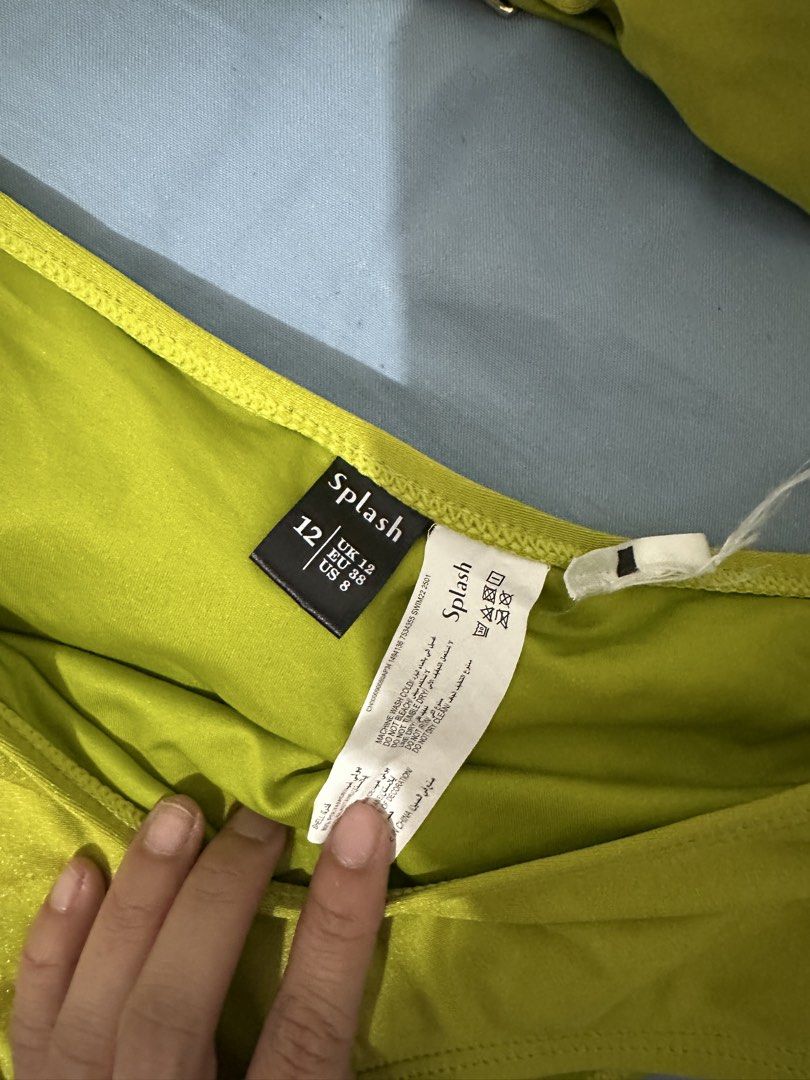 Splash Lime Green Bikini Set with Gold Detail (Category: Bikinis & Swimsuits) located in Lipa City. Submitted by chiechums (Listing ID 1457590796, Image 3). Description: - Lime green bikini set from Splash - Halter neck top with gold accent - High-waisted bottoms with knot detail - Size: 12 UK / 8 US - Ideal for beach or pool days - Comfortable and stylish.