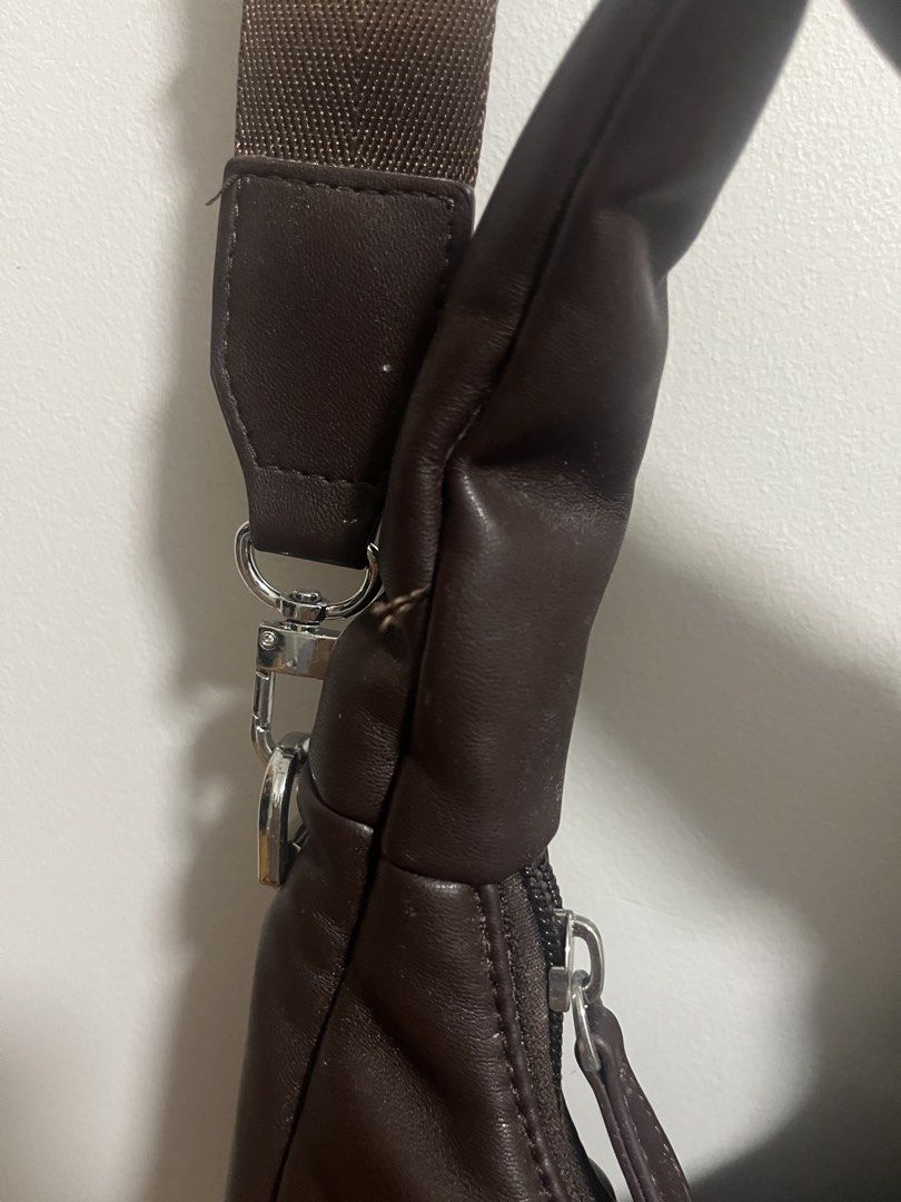 Straightforward Brown Crossbody Bag (Category: Shoulder Bags) located in Manila. Submitted by carminarom81090 (Listing ID 1457614085, Image 3). Description: Lightly used Straightforward crossbody bag with minor stitching issues shown in pictures (although these stitches were already present when I bought them brand new).