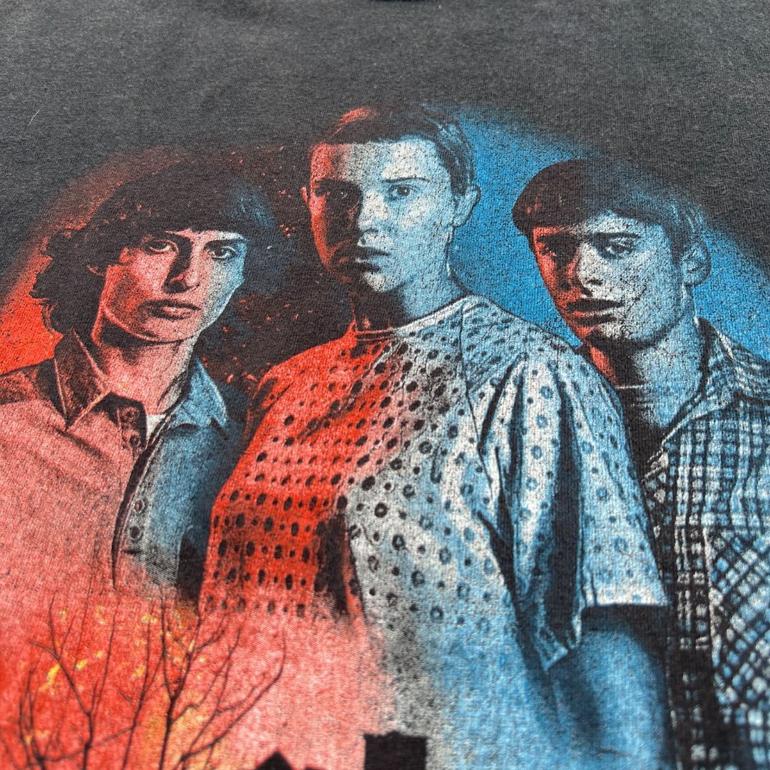 Stranger Things Character GOAT Graphic Tee Mens Medium (Category: Tshirts & Polo Shirts ) located in Talisay. Submitted by sidequested.archive (Listing ID 1457648286, Image 2). Description: 🏷️ Item Code: SQ097ae 📝Details • Condition: Pre-loved; good overall condition with a naturally faded, worn-in black finish. • Color rating: 8/10 • Size: M (on tag; see measurements for accuracy) • Measurements (in inches): 21’ W × 28’ L Overall rating: 8.5/1