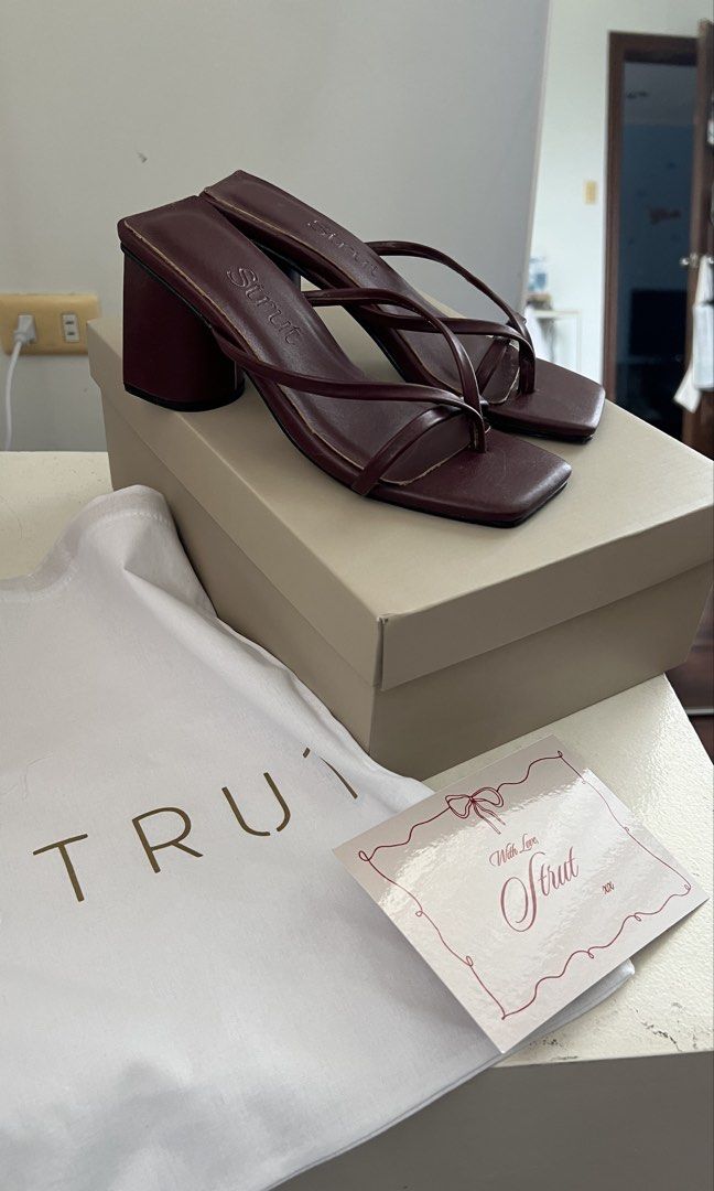 STRUT Burgundy Heels (SIZE 5) (Category: Heels) located in Quezon City. Submitted by sr_1521 (Listing ID 1457529823, Image 2). Description: - Square toe - Block heel - NEVER BEEN USED - Rfs: extra pair - Og price: around 1.5k .