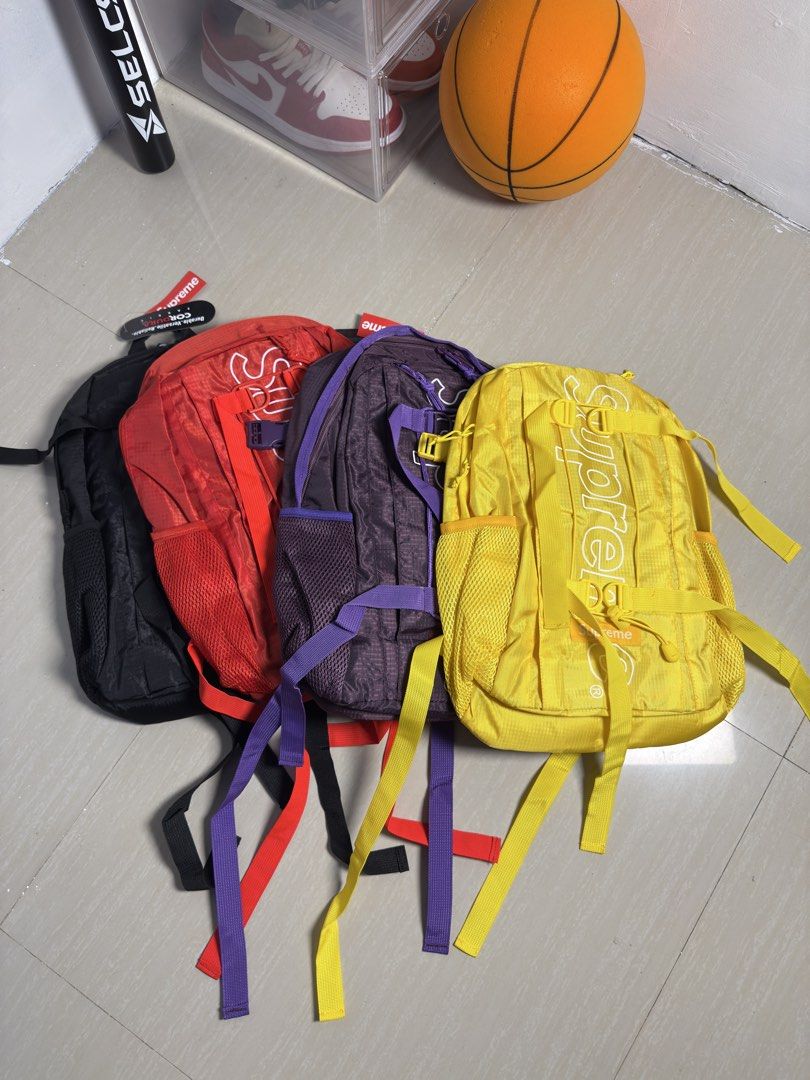 Supreme SS20 and FW18 Backpack (Category: Backpacks) located in Lipa City. Submitted by mikelarc (Listing ID 1457676346, Image 2). Description: - Supreme Backpacks available in Blue Camo, Red, Black, Purple, and Yellow. - Crafted from durable Cordura fabric for long-lasting use. - Ideal for daily commutes or exciting travel adventures. - Offers ample space to carry all your essentials. - good for streetwear fits.