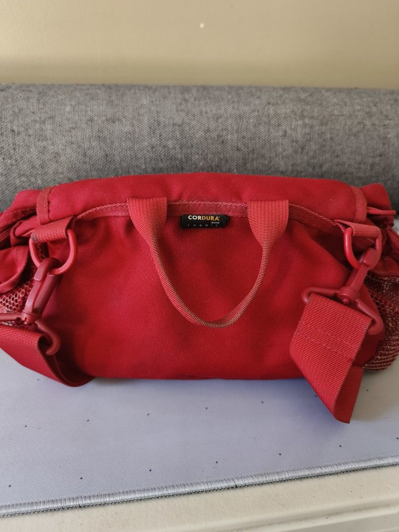 Supreme Waist Bag SS20 Red (Category: Luxury Bags & Wallets) located in Angeles City. Submitted by backyard_treasures (Listing ID 1457709462, Image 2). Description: Supreme Waist Bag SS20 Spring Summer Collection 100% Authentic Pre loved, used but not abuse ✅ features durable Cordura fabric, a prominent mesh front compartment with a tonal logo, and dual buckle straps..