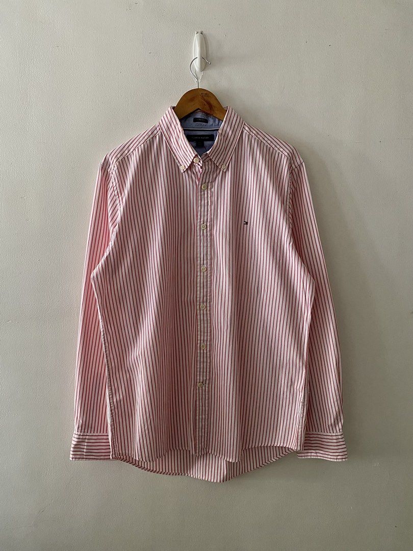 Tommy Hilfiger Red Pinstriped Long Sleeve (Category: Formal Shirts) located in Quezon City. Submitted by rlphvncntbs (Listing ID 1457666667, Image 1). Description: Tommy Hilfiger Red Pinstriped Long Sleeve Size: Large Measurements: 23" x 30" Excellent Condition ₱2,000 + SF (Negotiable).