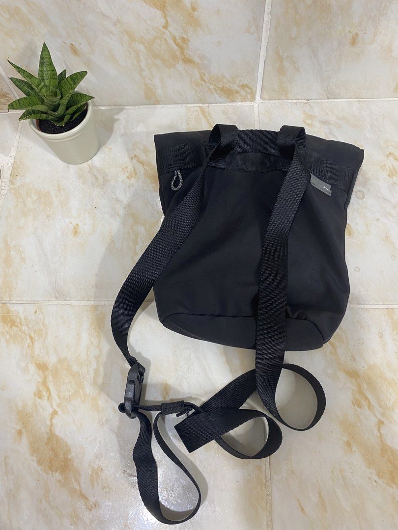 Topologie Black Roll Top Bag (Category: Backpacks) located in Manila. Submitted by haveago0dthrift (Listing ID 1457630535, Image 3). Description: - Brand: Topologie - Color: Black - Style: Roll top backpack - Closure: Buckle - Features: Adjustable straps, interior pockets for organization - Ideal for: Everyday use, travel - Design: Clean and simple.