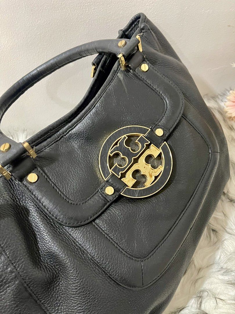 Tory Burch Amanda Leather Shoulder Bag / Tote Bag (Category: Luxury Bags & Wallets) located in Teresa. Submitted by savvyonbranded (Listing ID 1457599473, Image 3). Description: 10.5 x 15 x 5.5 inches Replace sling strap Sign of use on handle’s rubber lining.