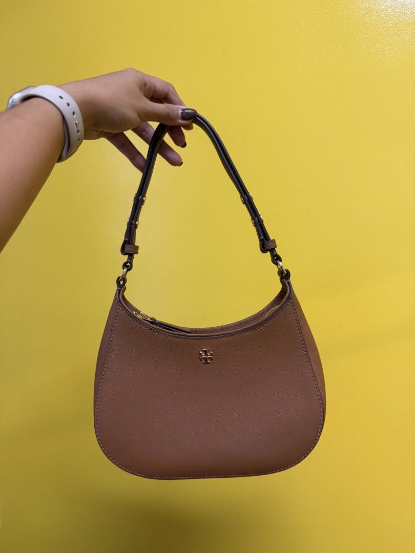 Tory Burch Brown Leather Hobo Shoulder Bag (Category: Luxury Bags & Wallets) located in Manila. Submitted by previosly.mine (Listing ID 1457553341, Image 1). Description: - Genuine brown leather Tory Burch hobo bag - Elegant gold hardware details on the strap - Secure zipper closure - Comes with original receipt from Tory Burch San Francisco Premium Outlet - Ideal everyday bag.
