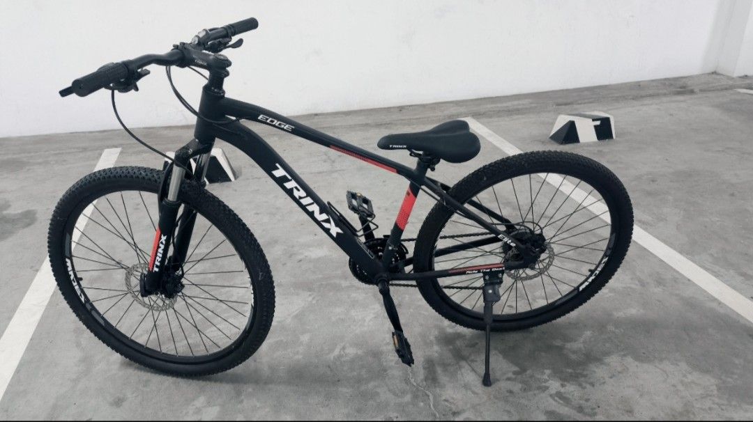 Trinx Edge Elite 27.5" (Category: Bicycles) located in Makati City. Submitted by masterunos65086 (Listing ID 1457609526, Image 1). Description: Frame: Trinx Alloy Frame 16" Brake: RSX Hydraulic Disc Brake Shifter: Shimano (3*7) Front Derailleur: Shimano Rear Derailleur: Shimano Tourney Fork: Suspension Fork Tire: 27.5" 2.10 Speed: 21 speed.
