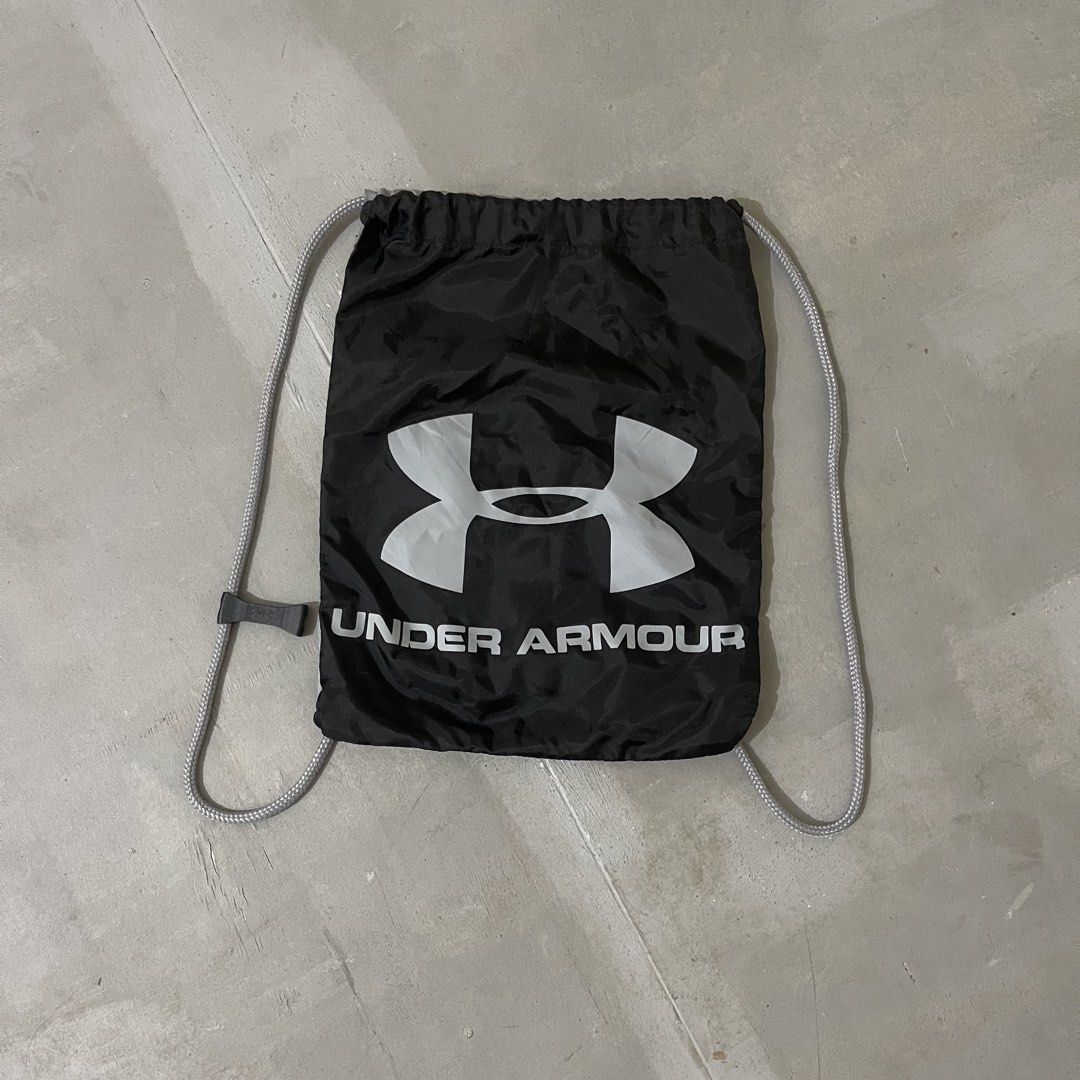 Under Armour Black Grey Drawstring Bag (Category: Backpacks) located in Manila. Submitted by bravebird_164362 (Listing ID 1457655106, Image 1). Description: UA BACK DRAWSTRING BAG LIKE NEW NO FLAWS DM.
