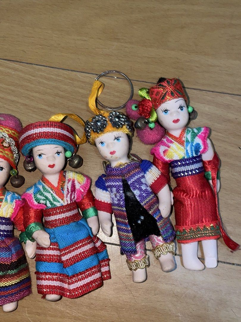 Vintage Asian Porcelain Doll Keychains (Category: Vintage Collectibles) located in Manila. Submitted by declutteredbyalex (Listing ID 1457638771, Image 3). Description: - collection of 5 vintage Asian ethnic/Hill Tribe porcelain miniature doll keychains. - each doll features hand-painted porcelain faces & colorful traditional folk outfits - made out of porcelain Height: approx. 3.5 to 4 inches each. RFS: Decluttering.