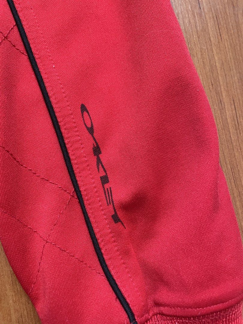 Vintage Oakley Red Track Jacket (Category: Coats, Jackets and Outerwear) located in Angeles City. Submitted by twinklee.555 (Listing ID 1457559760, Image 3). Description: -Only used twice, has small stain in the front upper right shoulder -Unisex.