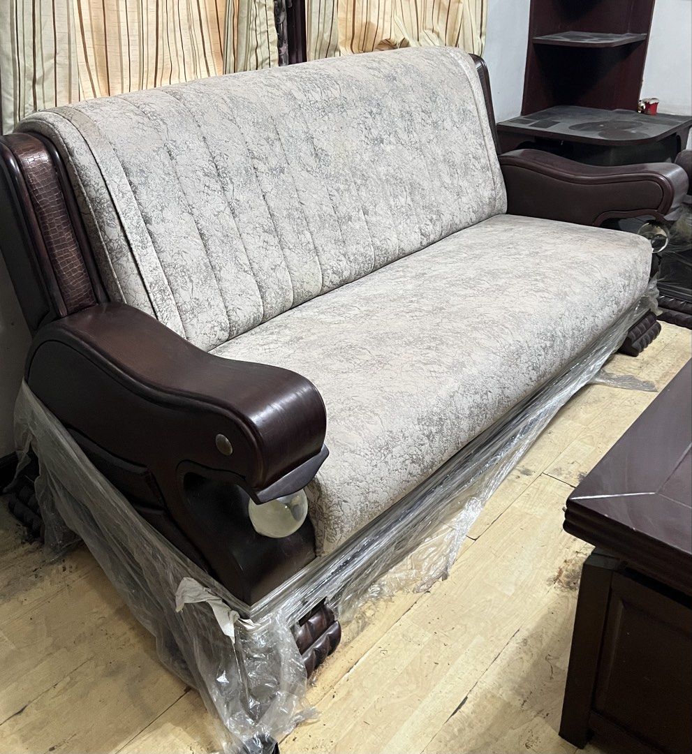 Vintage Wooden Sala Set (Category: Sofas) located in Makati City. Submitted by audreyngoldilocks (Listing ID 1457691378, Image 2). Description: Vintage Wooden Sala Set – 3-Seater + 2 Armchairs + Center Table ₱30k – slightly negotiable Willing to meet up for inspection :) Set includes: • 1 × 3-seater sofa • 2 × single-seater armchairs • 1 × matching center/coffee table Details: • China-made/imported wooden furniture • Dark brown wood finish • Crea