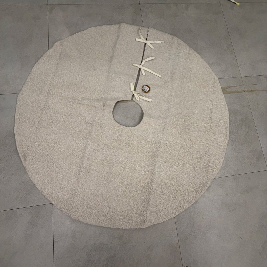 West Elm Boucle Tree Skirt - Cream (Category: Other Home Decor) located in Manila. Submitted by pinklilo (Listing ID 1457605683, Image 1). Description: - Cream boucle tree skirt from West Elm - Ties at the front for easy closure - Adds a cozy texture to your holiday decor - Measures approximately 48 inches in diameter.