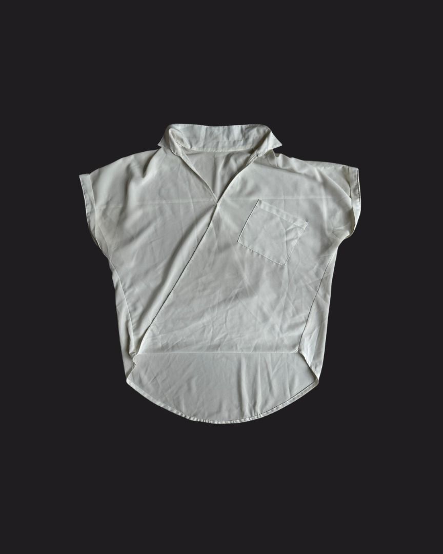 White Sheer Collared V-Neck Blouse with Pocket (Category: Blouses) located in Mandaluyong City. Submitted by shopsunnymoody (Listing ID 1457629233, Image 1). Description: White see-through v-neck blouse with functional pocket | High-low effect fits up to Medium width: 62 cm length: 56 cm front, 66 cm back 9/10 quality: minimal green stain 250 php + SF.