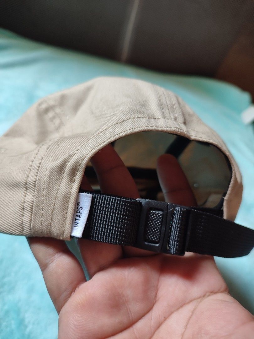 WTAPS 5 Panel Cap Beige (Category: Caps & Hats) located in Puerto Princesa. Submitted by thriftedsoulsy2k (Listing ID 1457628134, Image 2). Description: - Brand: WTAPS - Style: 5 Panel Cap - Color: Beige - Material: Acrylic and Beanie - Features: Adjustable strap at the back - Detail: 'Long Live WTAPS' tag - Ideal for: Everyday wear.
