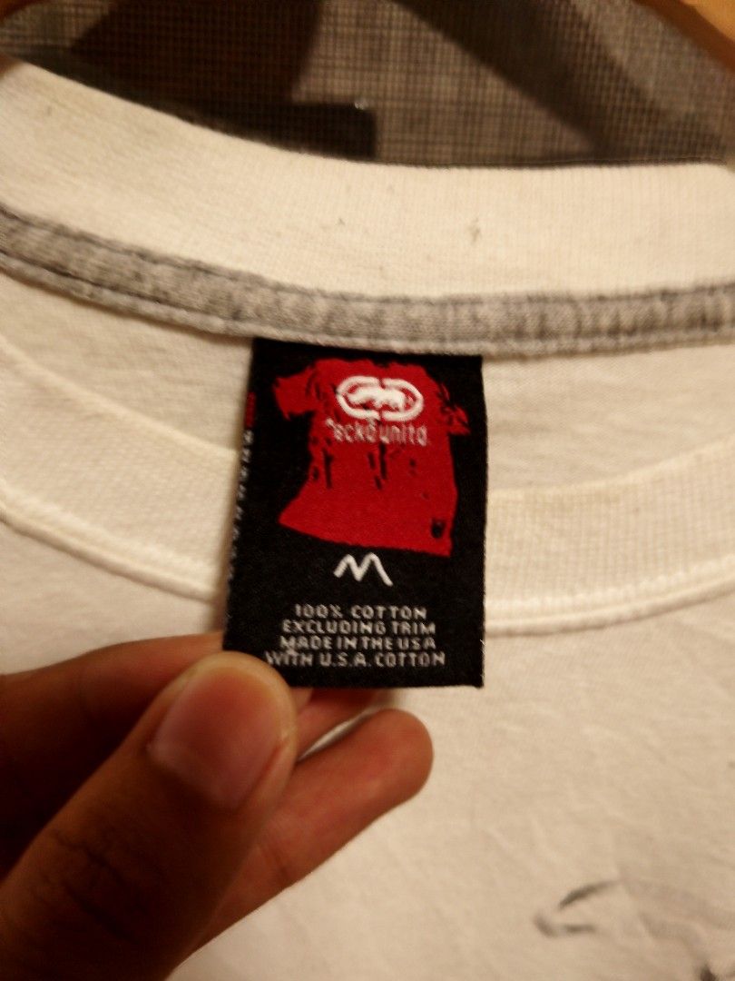 Y2K ECKŌ GRAPHIC TEE ( CREW NECK ) (Category: Coats, Jackets and Outerwear) located in Tuguegarao City. Submitted by kevvomaggad (Listing ID 1457652765, Image 3). Description: DIMENSIONS/MEASUREMENTS W : 23 L : 30 SZ : MEDIUM ON TAG BEST FIT : XL ISSUE : HAIR LINE / STAIN - DEEP WASH MO LANG 🧽 CONDITION : EXCELLENT TIGHT RIBBINGS COLOR RATE : 9.5 COMPLETE TAGS 🏷️.